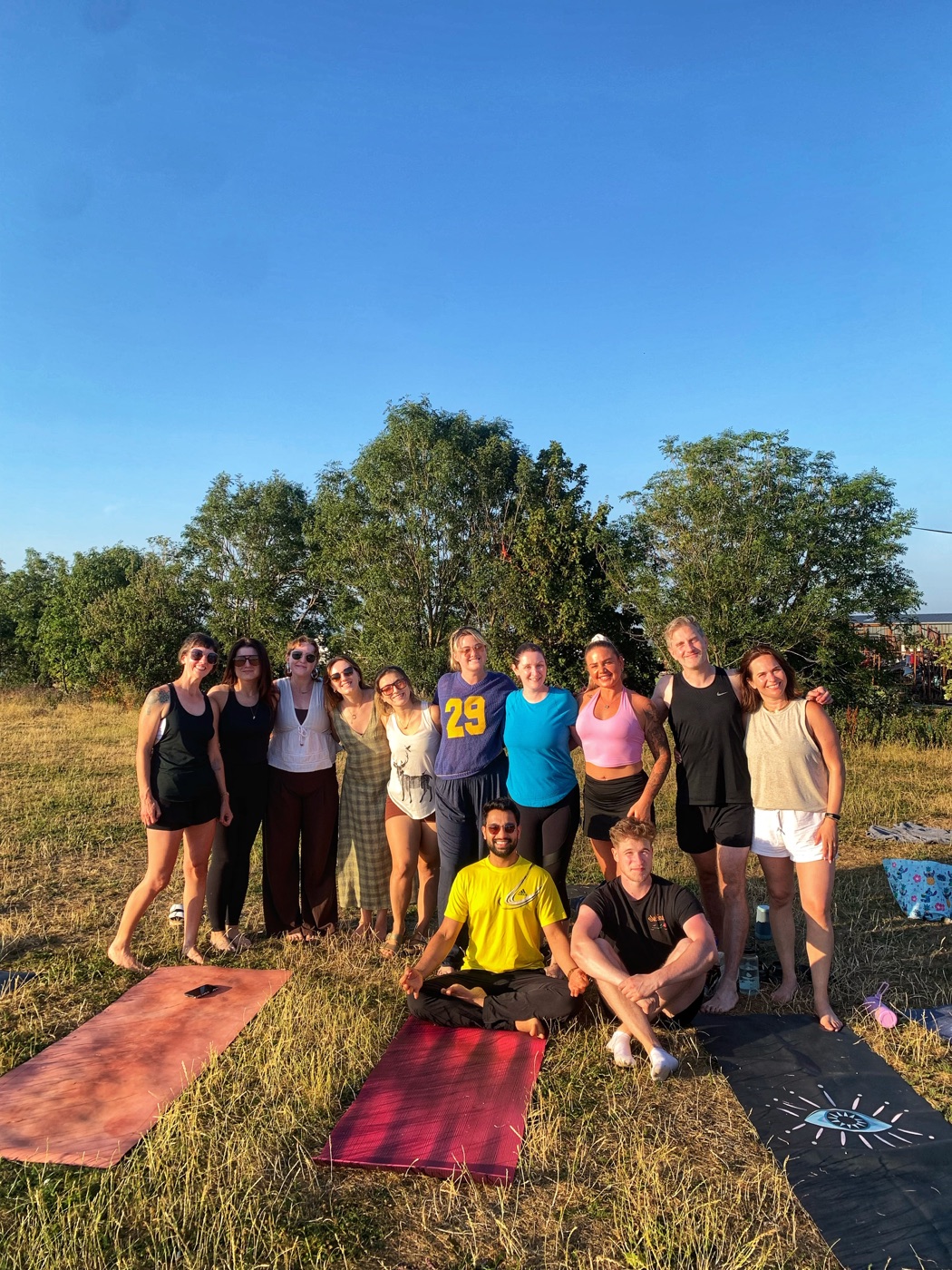 Group photo from Yoga by the Sea at Apna Park